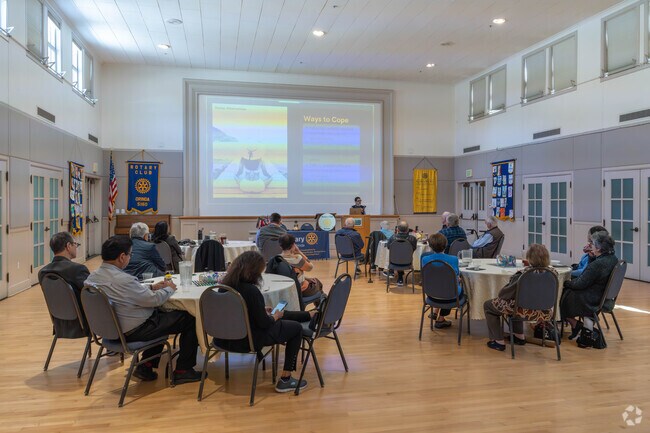 Participants listen intently at a Rotary Club presentation at the Orinda Community Center.