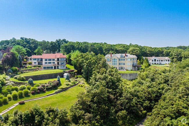 Many cliffside homes in Belle Terre feature terraced landscapes to take advantage of the view.