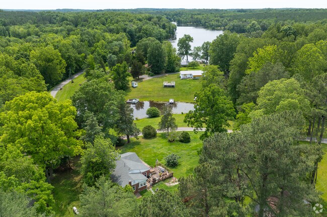 Aerial views of Columbia, VA reveal the beautiful lakes that shape this scenic community.