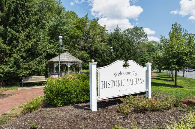 There is a welcome sign and gazebo in the center of Yaphank at Mill and Main Roads.