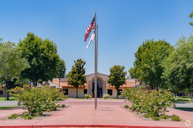 The flag flies high in front of the office at Bakersfield Christian High School