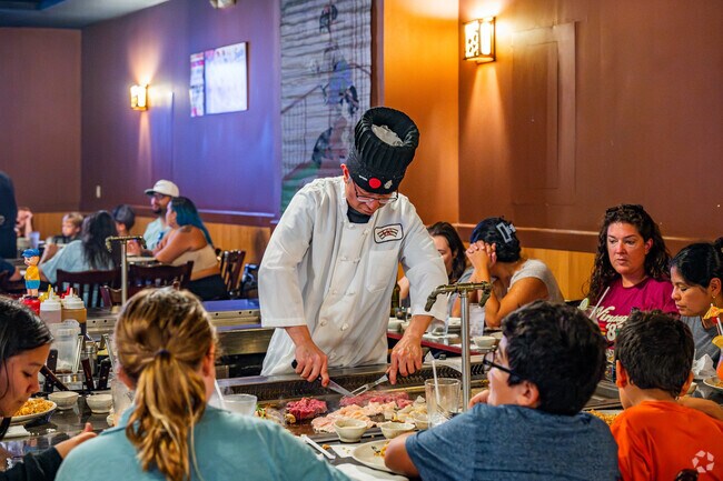 Residents of the Village of Duval  enjoy the show at VKI Japanese Steakhouse.