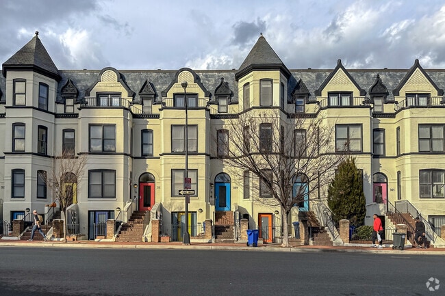 Golden hour casting on homes along Chinatown.