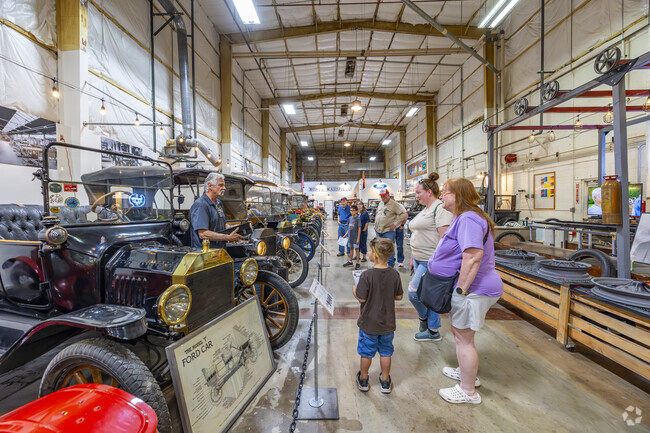 Rolling Thru Time in Fairgrounds invites visitors into a world of vintage cars, where every vehicle tells a story of the open road.