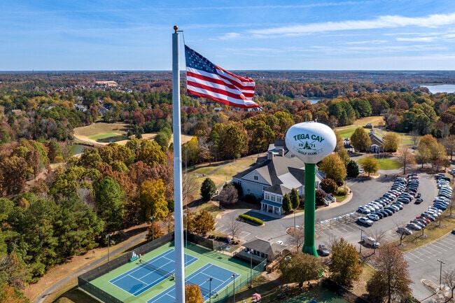 Tega Cay Golf Club offers golf, tennis, croquet, and dining options.