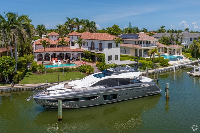 It's not uncommon in Royal Harbor to see large, privately owned yachts docked behind the homes.