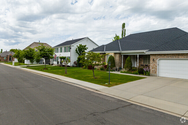 A row of homes in Hillcrest presents a cohesive and pleasing streetscape.