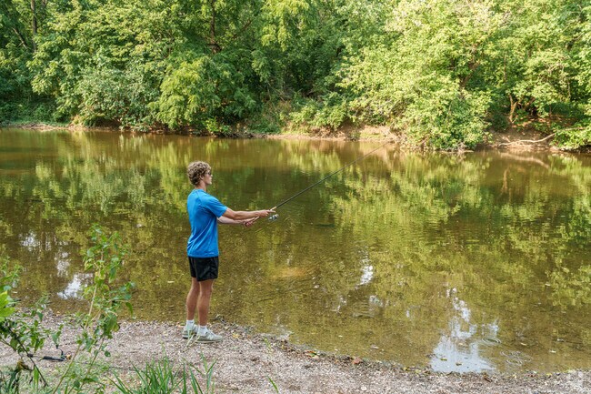 A lad tries his hand at fishing at Lancaster County County Park near Quaker Hills.