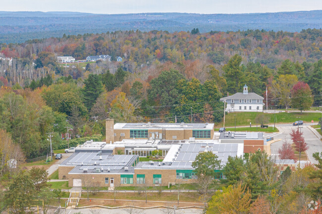 Naquag Elementary School is surrounded by trees in the heart of Rutland.