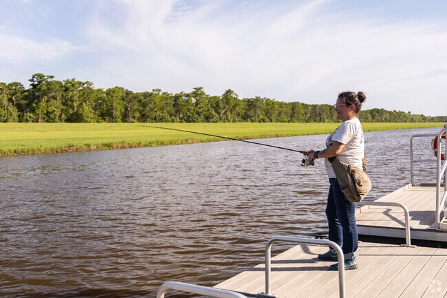 Estelle locals enjoy fishing the waters at Parc Des Familles.