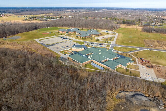The campus of Oaktree Elementary School includes various sports fields.
