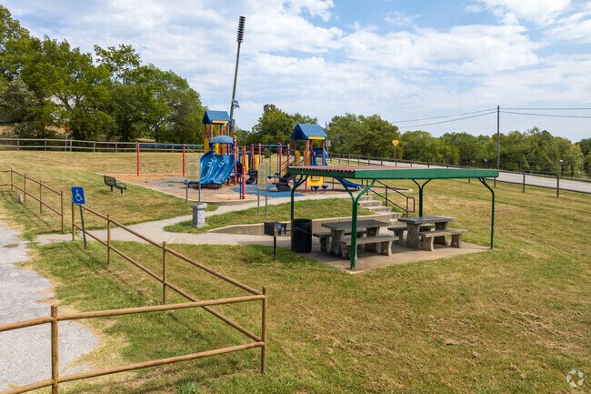 Triangle Park, nestled within Tulsa , offers a serene green space.