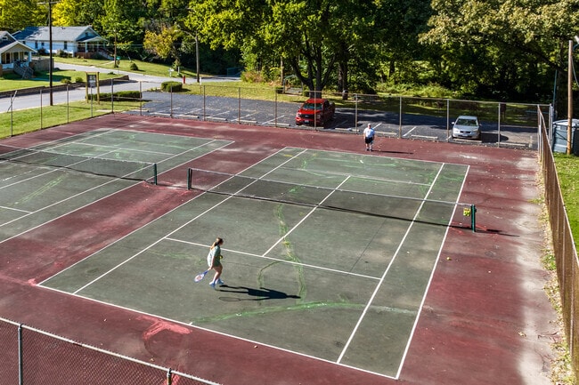 Mildred Keeney Park in Claycomo offers tennis courts for family recreation.