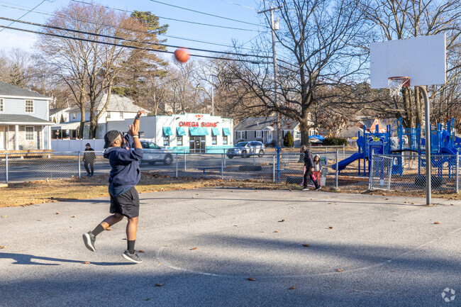 The Pinehurst Playground offers a basketball court, playground, and large grass field for events