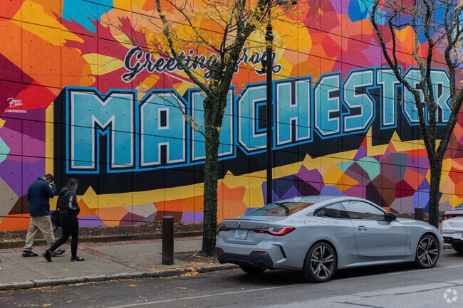 In downtown Manchester you can find a colorful and vibrant mural.