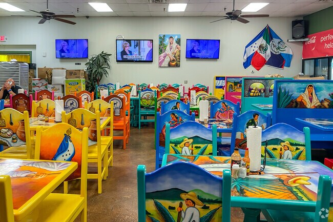 The restaurant at Carniceria El Ranchito in Oaklawn has one-of-a-kind furniture with unique Mexican motifs.
