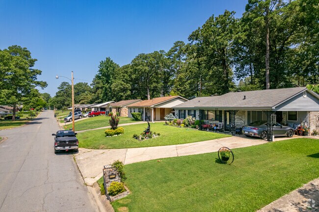 A row of ranch-style homes in Cloverdale Watson maintains neatly-manicured lawns.