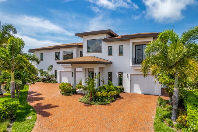 New Modern-Style mansion are being built on the waters edge in Seminole Neighborhood.