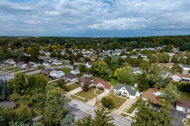 Cozy homes sit on wooded lots throughout North Randall.