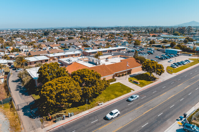 Palomar High School in Harborside shows the skyline view of the main road and the nearby trees.