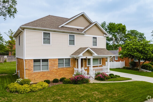 Hatlen Heights homes sometimes incorporate a blend of brick and wood structure.