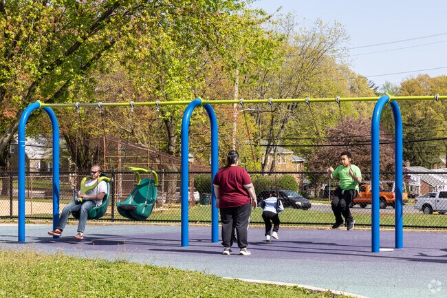 Everyone likes to use the swings at Torresdale Park.