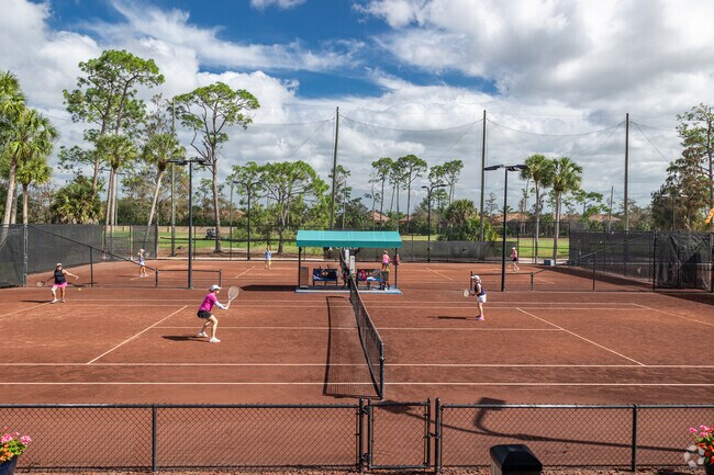 Olde Cypress has several clay tennis courts for its members.