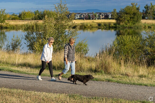 A couple of retired Bozeman Ponds residents enjoy their walk at Gallatin County Regional Park.