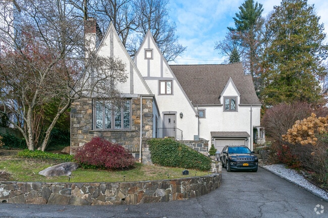 This beautiful custom-built home is located on Weyburn Road in the Beech Hill neighborhood.