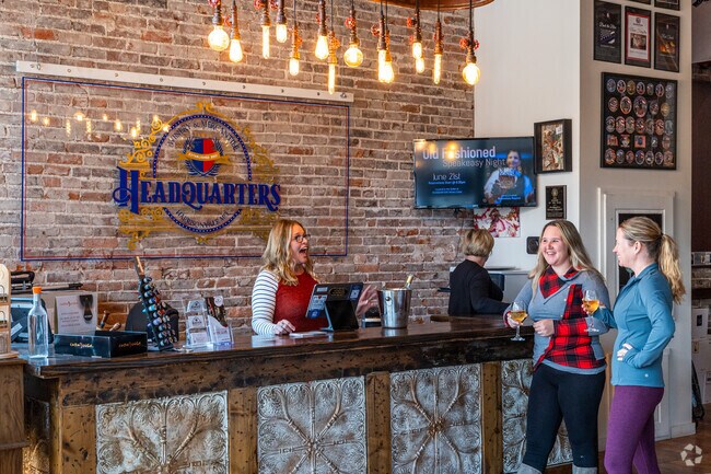 Locals stop in for a wine tasting at Headquarters Winery & Mercantile in downtown Harrisonville.