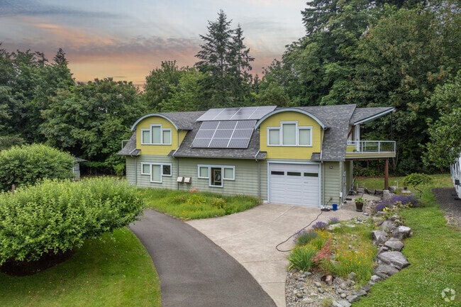 Most inland homes in North Olympia are surrounded by towering trees and dense woodlands.