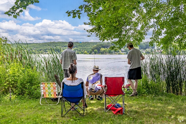 Families gather at the serene Musconetcong lakeshore to cast lines and create timeless memories in Stanhope’s natural sanctuary.