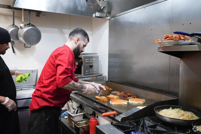 The Little Cake Café is a beloved breakfast spot in Newington, known for its cozy atmosphere and locally adored menu.