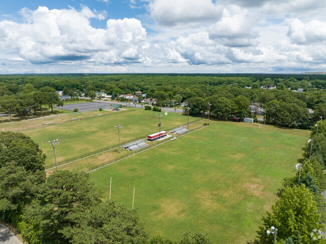 Barton Elementary School has two big fields in the back for football or soccer games.