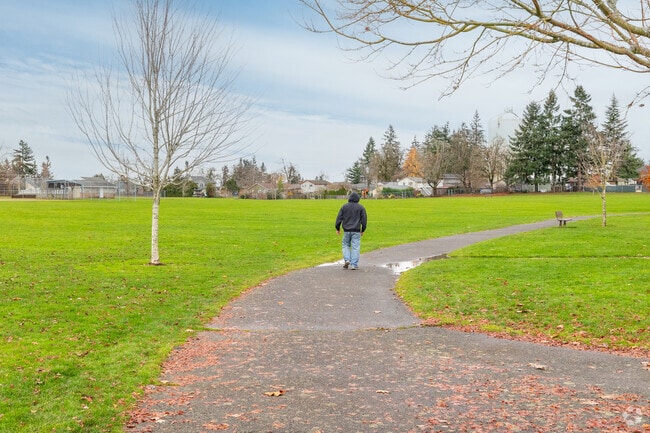 A man walks down the path at Chapin Park on Warner Parrott Rd in Oregon City.