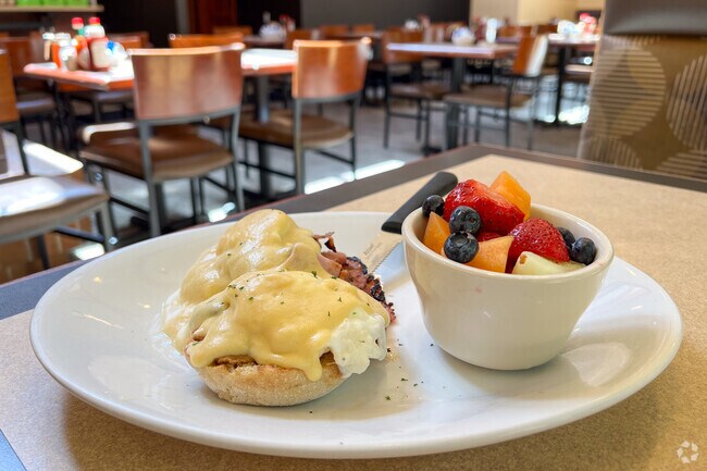 Eggs benedict with a refreshing fruit bowl is one of the many tasty Patty's Eggnest offerings.