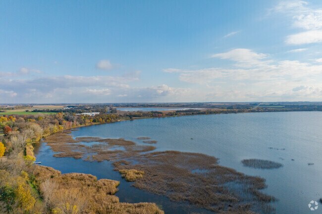 Lake Ripley offers calm water, open views, and seasonal color.