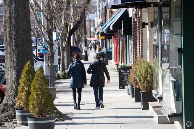 Local residents walking downtown in Englewood.