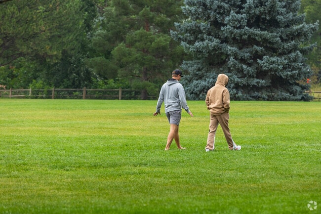 Locals come to walk the grassy meadows at Warren Park.