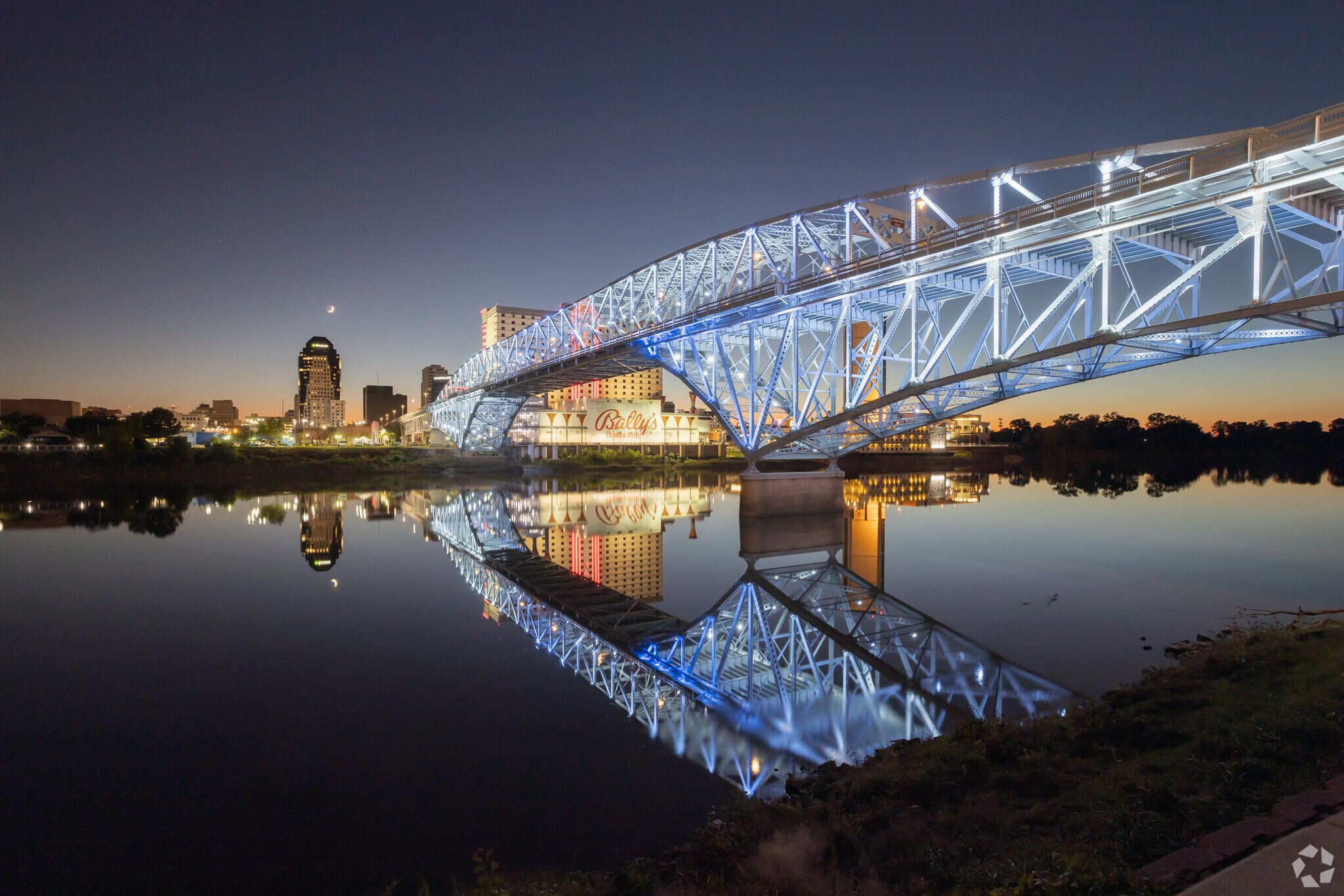 Towards dark, you can watch the sunset beyond the Red River and Downtown Shreveport.