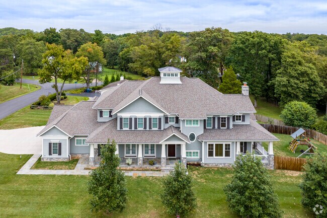 Kings Park West has large luxury single family homes surrounded by nature.