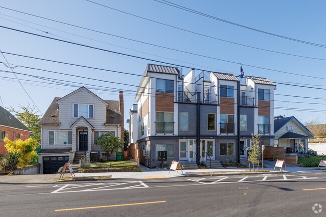 In the Seattle neighborhood of Roosevelt, there are newer built condos along with older homes.