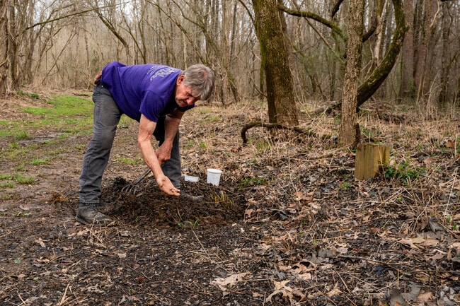 Locals dig for fishing worms along the Mountains-To-Sea Trail in Northeast Durham.