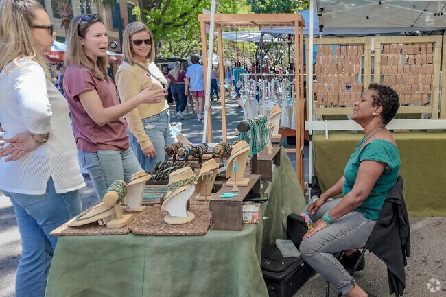 Jewelry enthusiasts are quick to strike up a conversation with artisan jewelers.