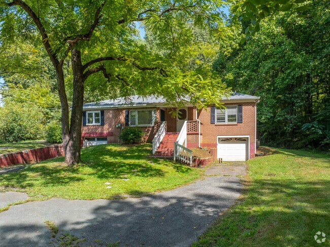 A brick raised ranch on Hickory Creek Rd in Covesville.