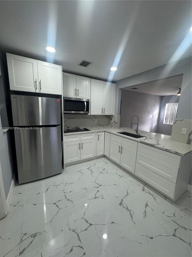 1171 NE 161st Terrace, Miami, FL 33162 - photo 3