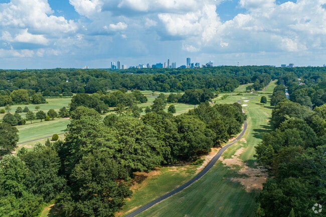 Midrise condos are visible from Chastain Park.