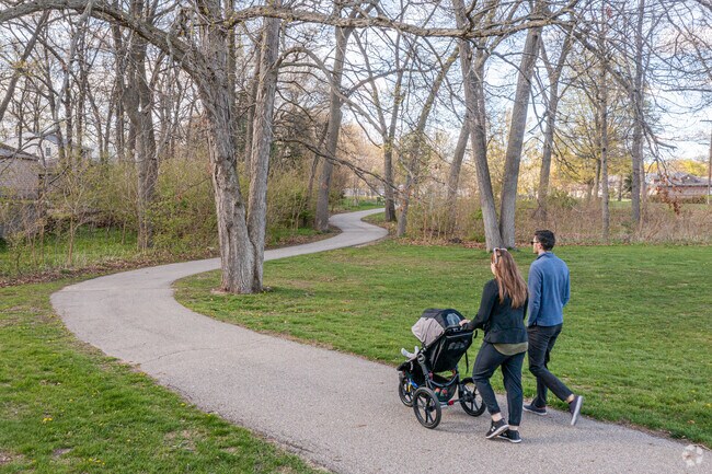 Residents of Oriole Park enjoy taking a stroll on the trails of Oriole Park.