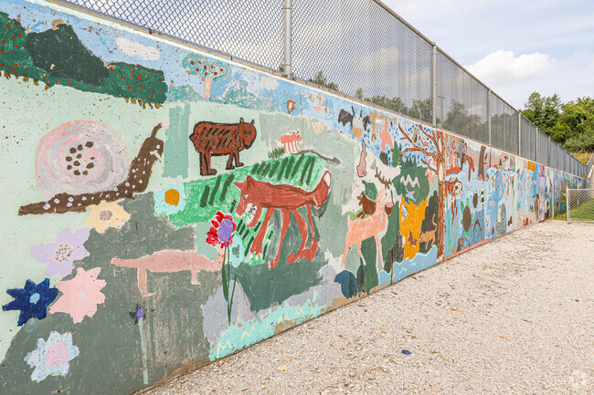 There is a student made mural lining the basketball court at Valley View Elementary School.