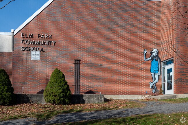 A mural of a girl decorates a door at Elm Park Elementary School in Worcester.
